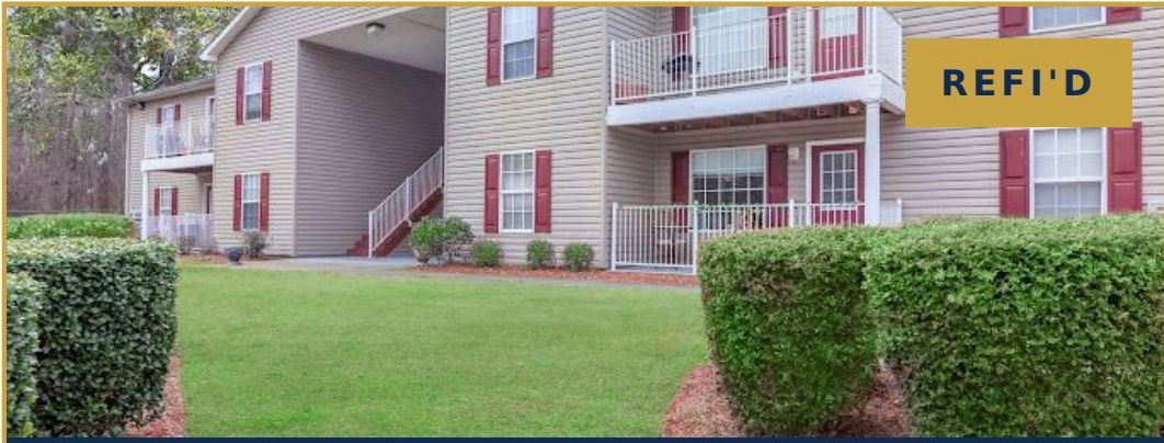 The Grove Apartment Homes — red brick multifamily community in Phenix City, Alabama